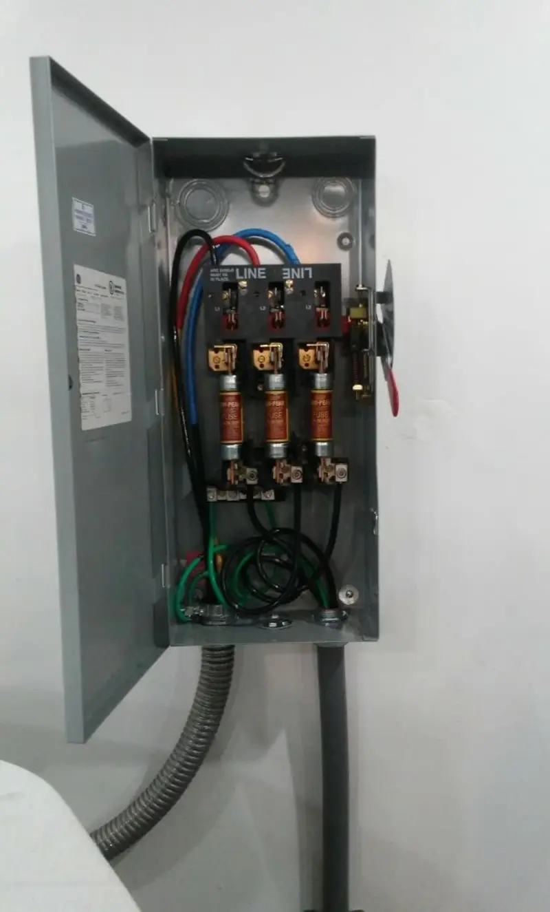 Three-phase disconnect switch installed for Smoke Detector Installation in Arkansas City
