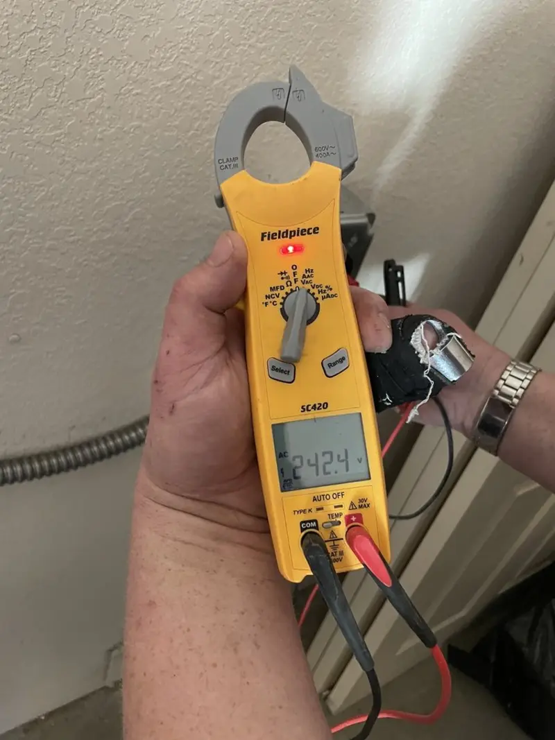 Voltage testing with clamp meter during Ceiling Fan Installation in Arkansas City